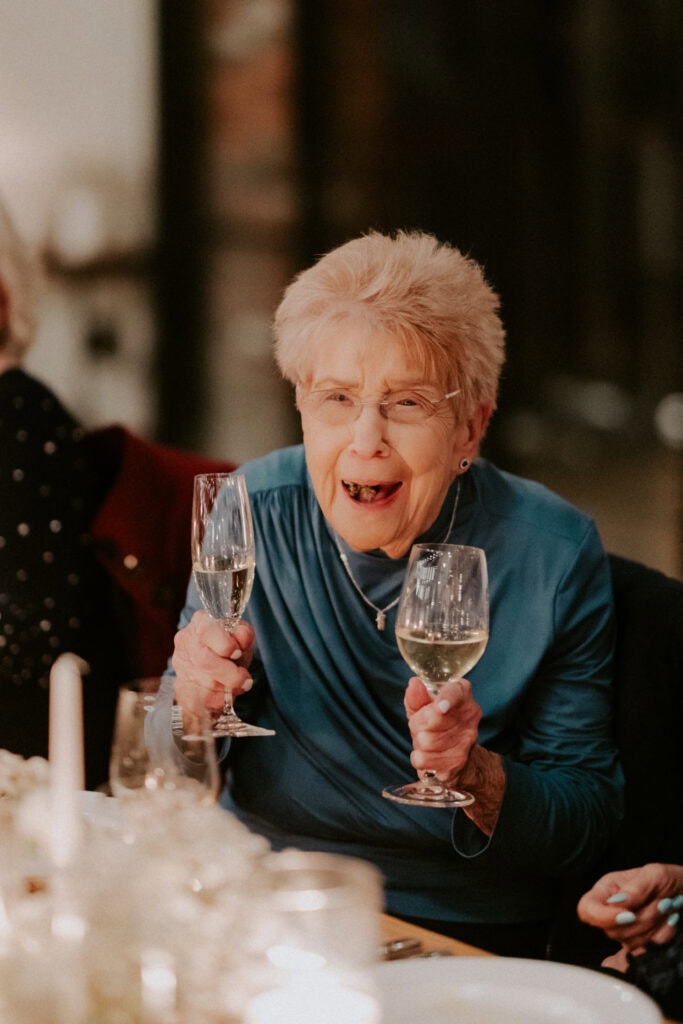 sweet grandma drinking champagne