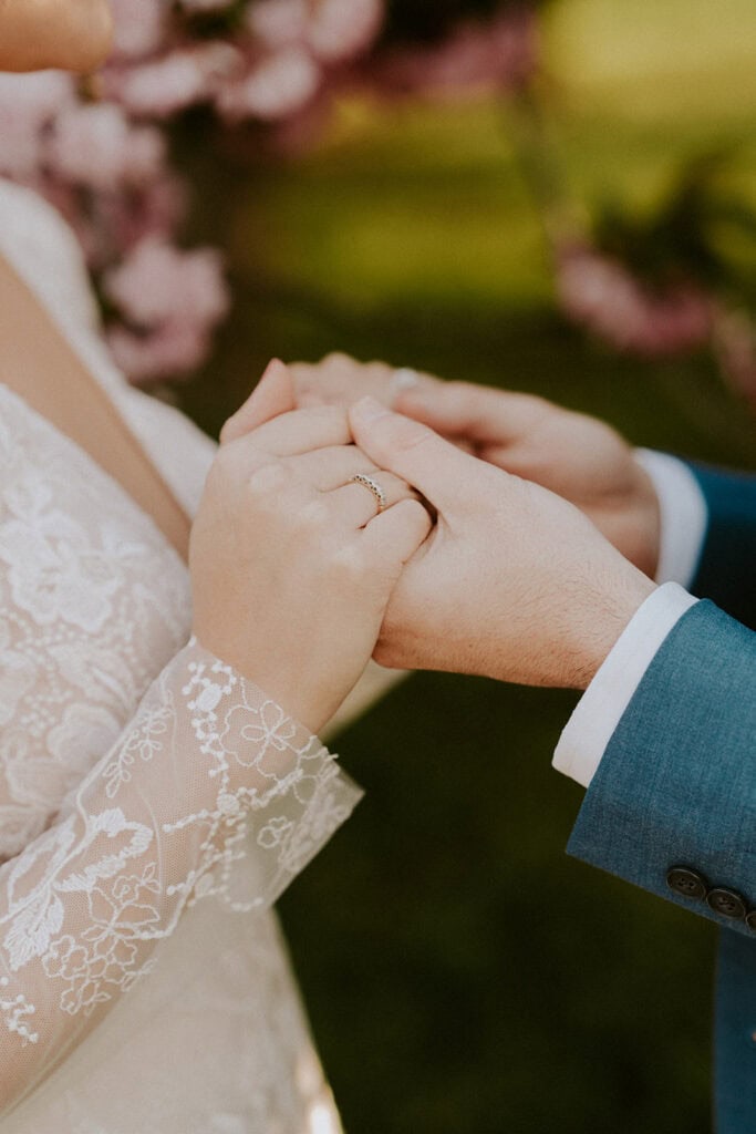playful bride and groom during their dc cherry blossom wedding