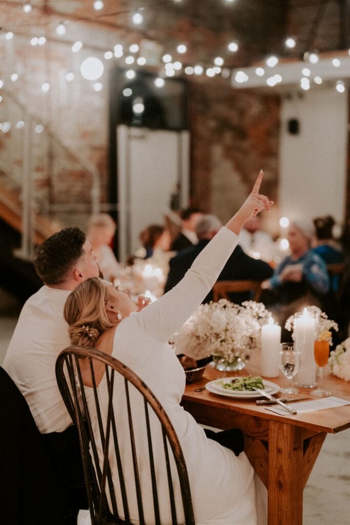 joyful bride and groom during wedding reception at Woodberry Kitchen