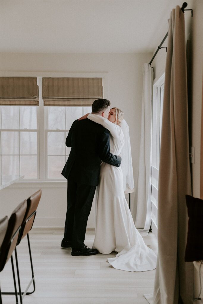 bride and groom first look at their living room