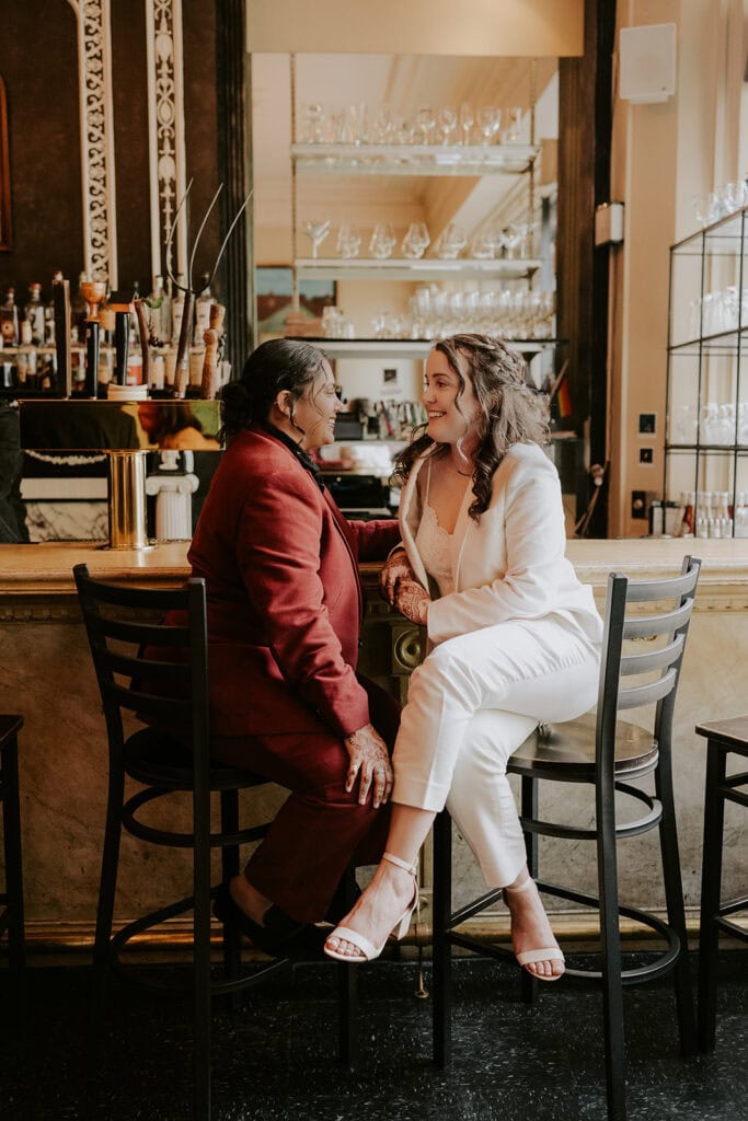 brides sitting at a bar