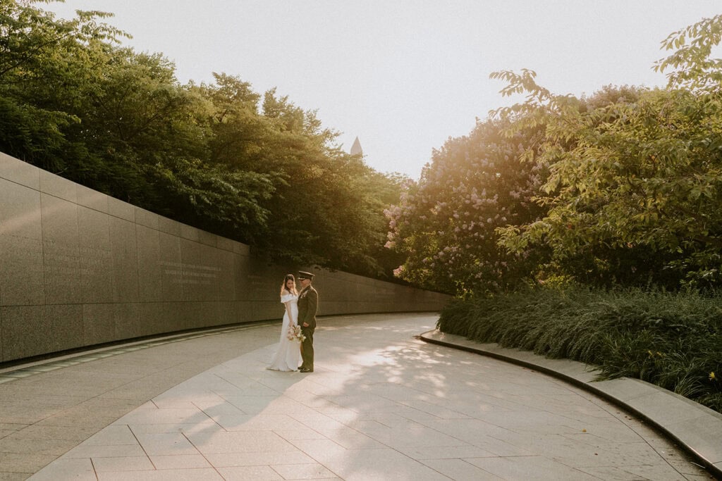 bride and groom walking along the tidal basin in dc